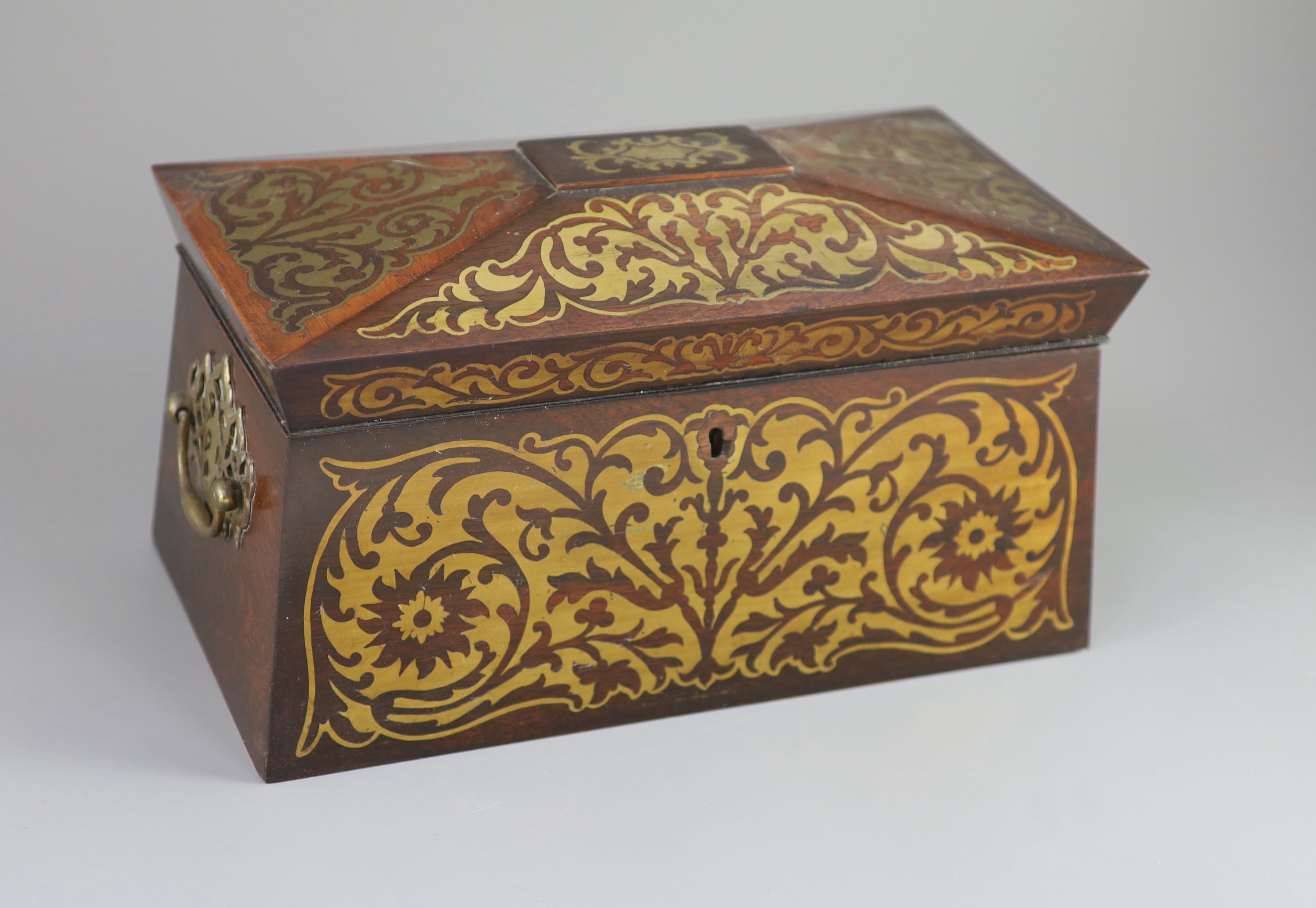 An early 19th century brass inlaid rosewood tea caddy in the boulle manner, 33 x 18cm, 18cm high.